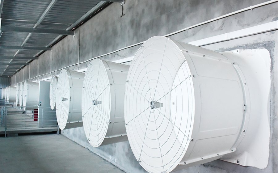 pig house ventilation fan and cooling pad system